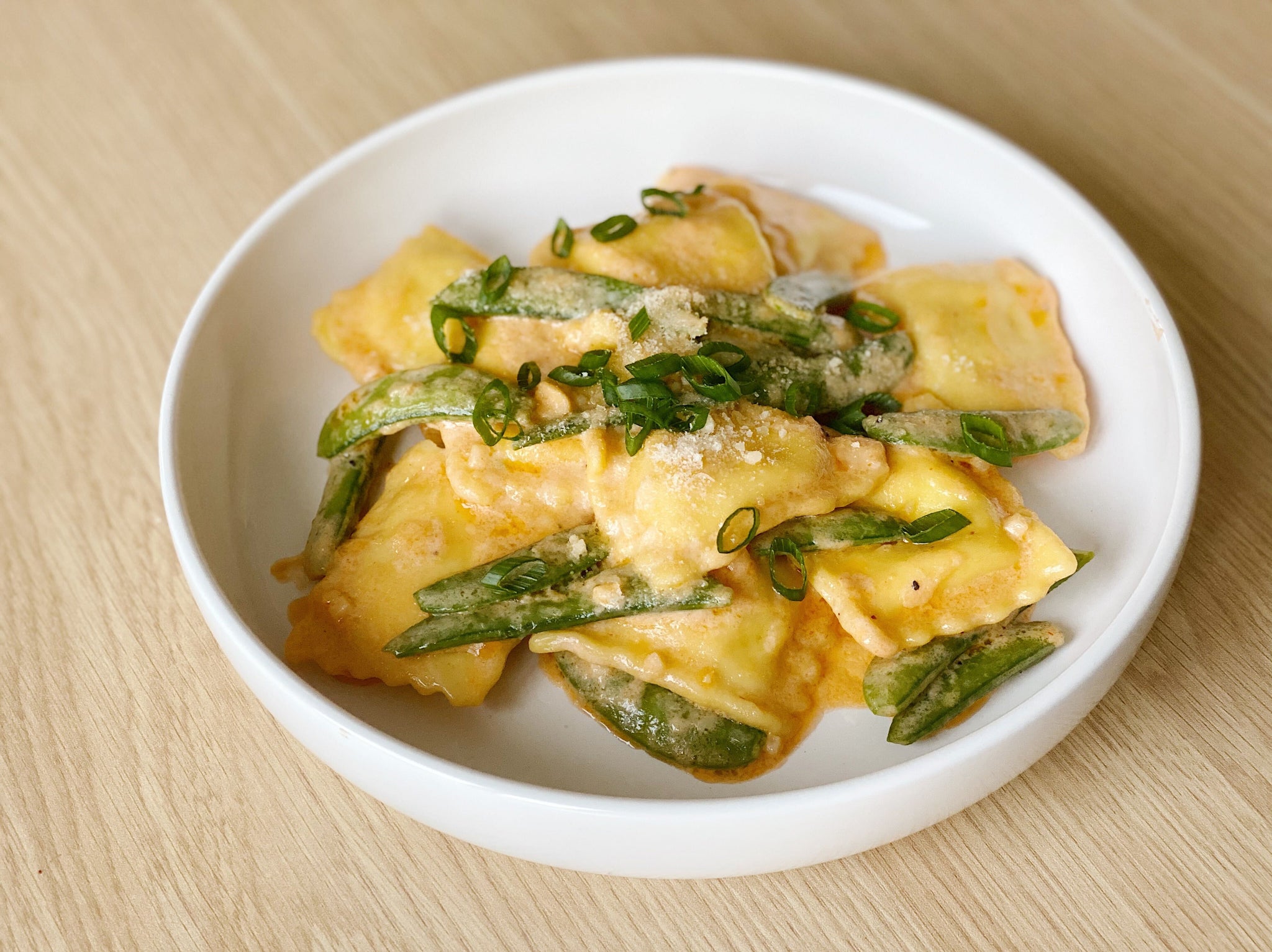 Three Cheese Ravioli Served with Pink Vodka Cream Sauce